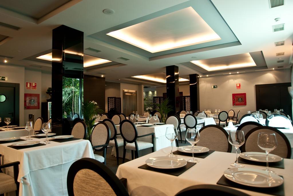 Hotel Infanta Leonor Écija Restoran fotoğraf